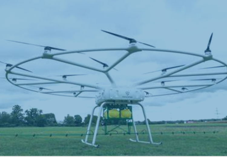 tech farming john deere autonomous drone sprayer in field 