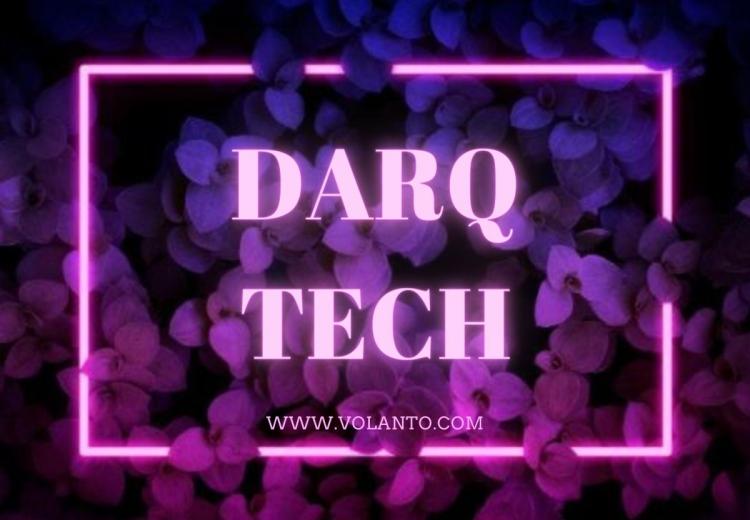 DARQ tech in pink neon with foliage background 